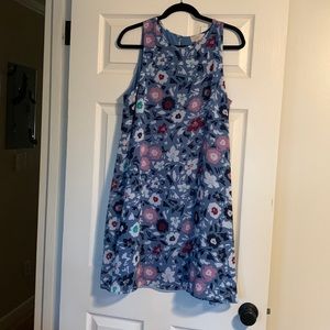 GORGEOUS, sleeveless, flowy dress with peep hole back closure